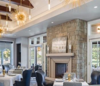 Barton Hills Country Club dining room with stone fireplace