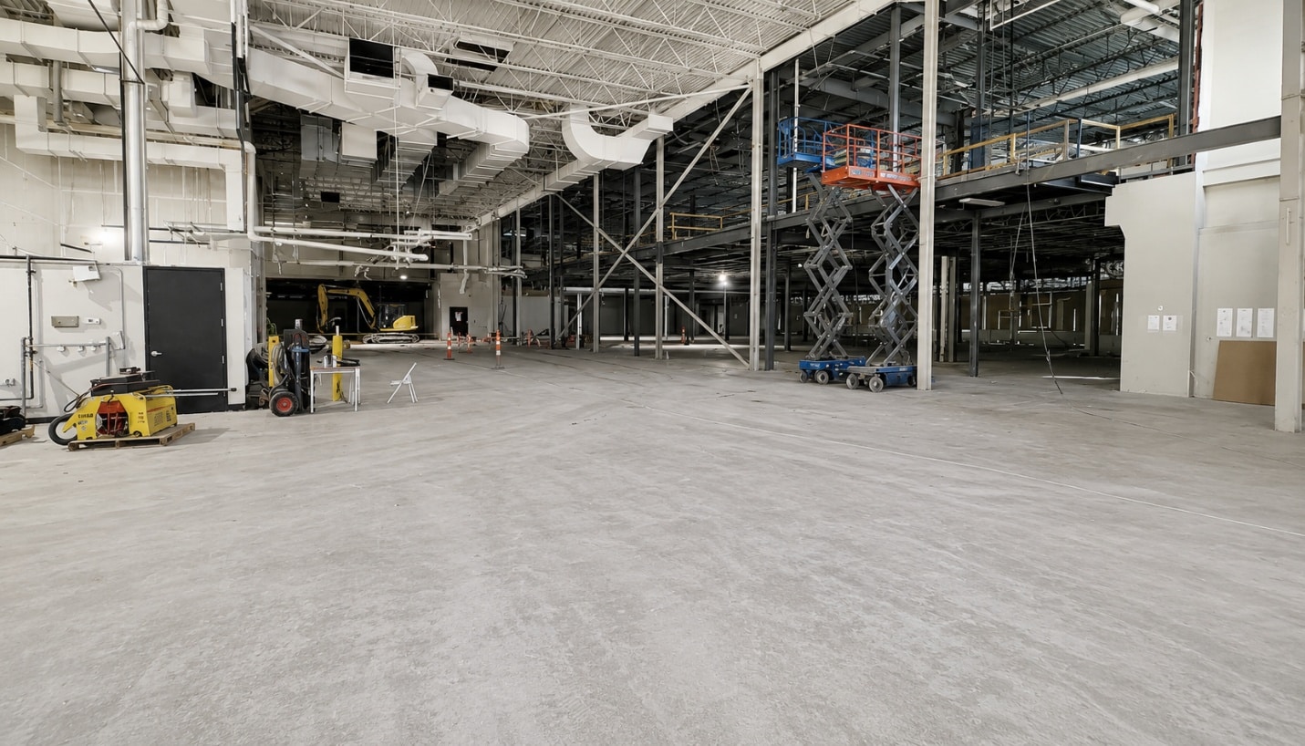 Interior industrial space at Executive Hills during selective demolition and repositioning work